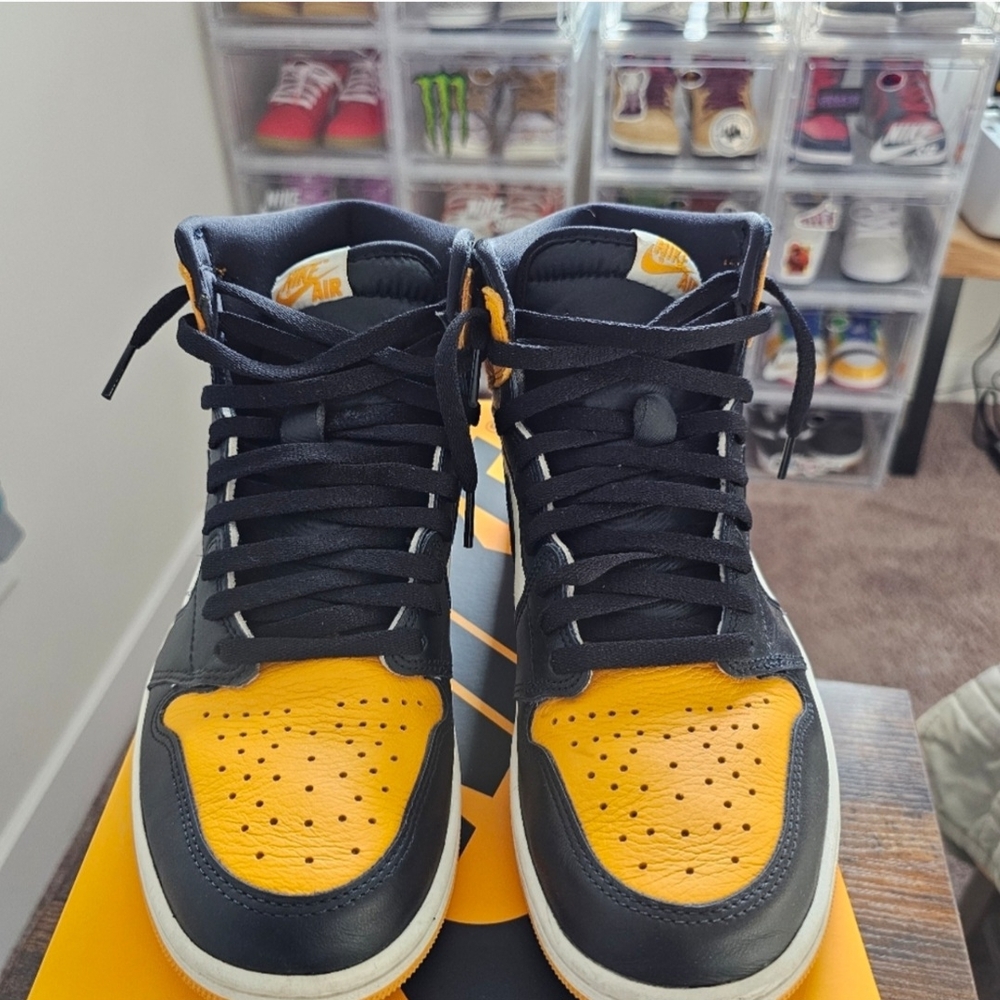 Nike  Jordan 1 Taxi Black and Orange Athletic High-Top Shoes